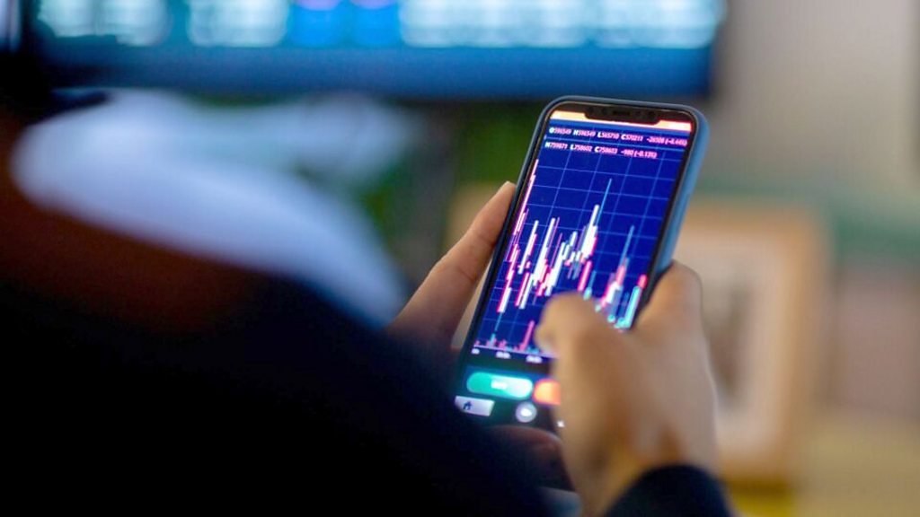 Professionals discussing insider trading related to the Iran war.