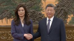 Taiwan opposition leader visit with Xi Jinping in a formal setting.