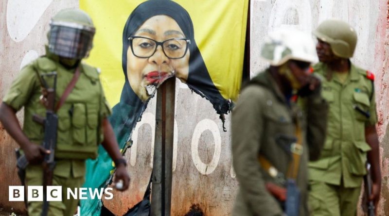 Group mourning at a memorial for victims of Tanzania election violence.