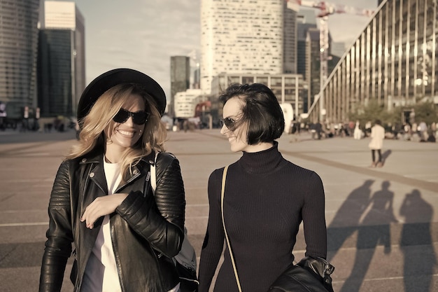 A group of friends in professional attire walking in New York City, hinting at Taylor Swift wedding rumors.