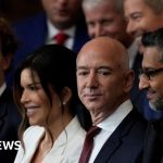 Tech earnings and AI spending discussed by professionals in a modern office setting.