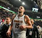 Timberwolves Jokic ejection scene during an intense playoff basketball game