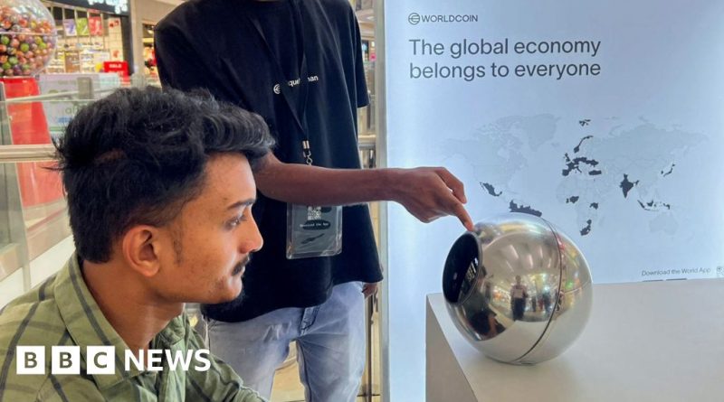 People using eye-scanning technology for user verification in a modern office.