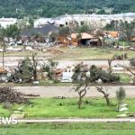 Aerial view of Texas tornado destruction showing damaged buildings and debris.