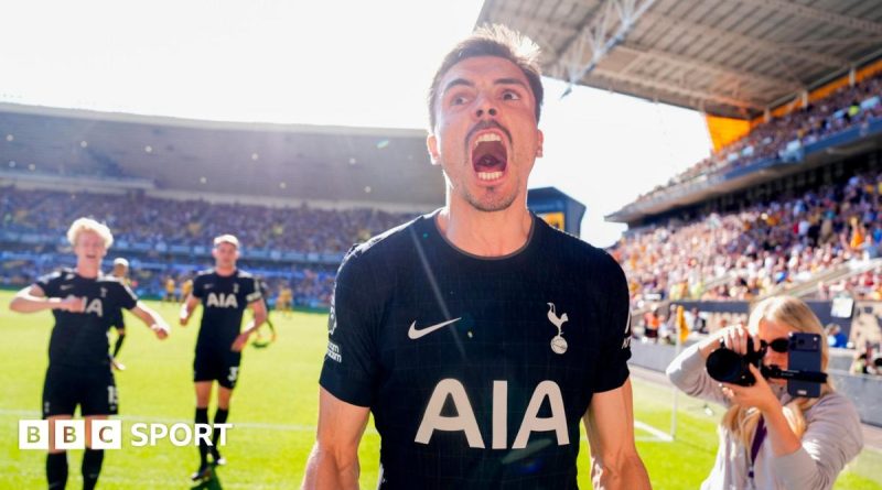 Tottenham players celebrating their Premier League win after a match.