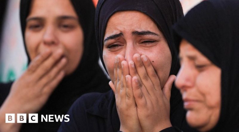 Healthcare professionals responding to victims of the Gaza airstrike.