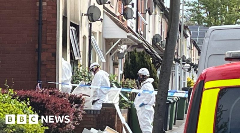 A community gathering showing support after a tragic house fire deaths.