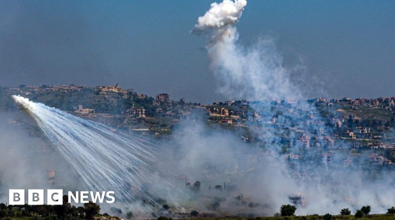 Emergency responders in southern Lebanon assist victims after attacks.