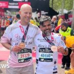 Sergio Aguiar and David Stancombe at the London Marathon finish line.