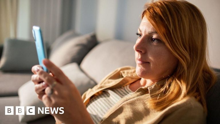 Professionals discussing passkeys for cybersecurity at a conference table.