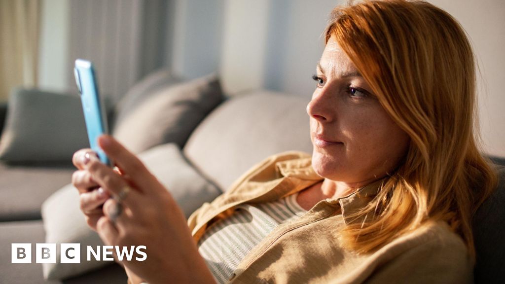 Professionals discussing passkeys for cybersecurity at a conference table.