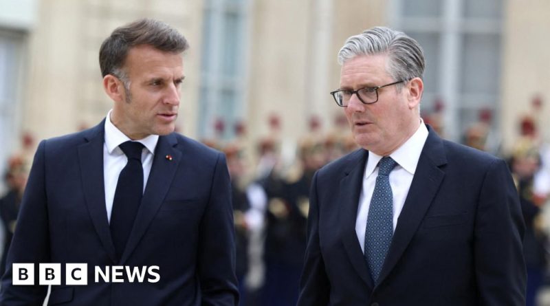 Military leaders from the UK and France plan the Strait of Hormuz defense mission in a conference room.