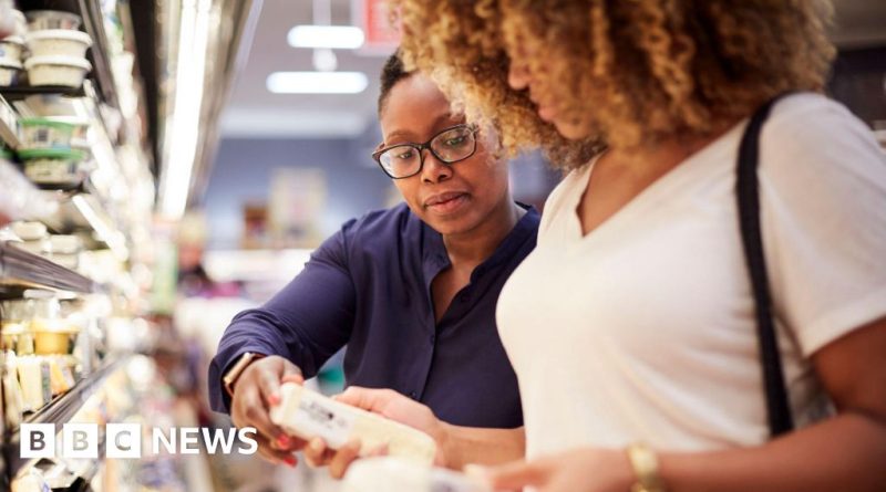 A serious discussion about UK inflation rise in a business setting.