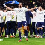 A meeting about UK nations World Cup qualifications with a soccer context.