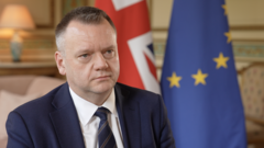 Professionals discussing UK EU relations in a modern conference room.