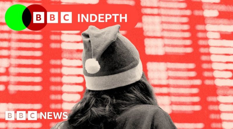 A busy train station during Christmas showing travelers and families amid UK rail disruptions.