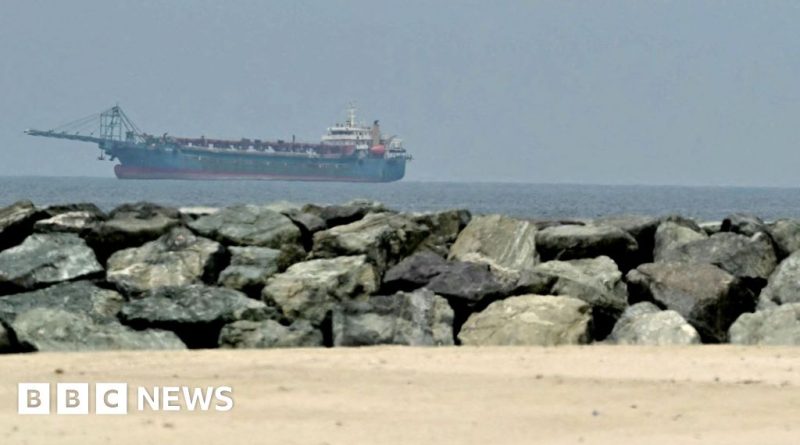 Officials discussing the US blockade on Iran in a formal meeting.