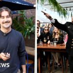 People enjoying the Two-Up betting game during Anzac Day celebrations.