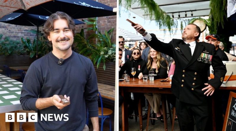 People enjoying the Two-Up betting game during Anzac Day celebrations.