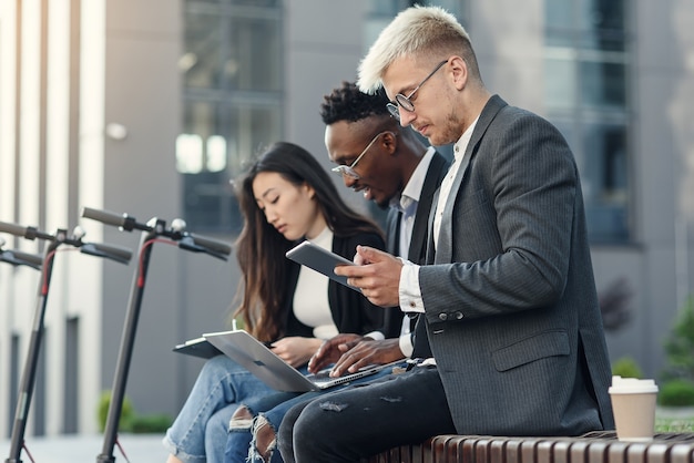 Corporate professionals discussing a Universal Music acquisition proposal.