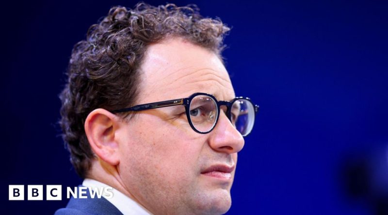 Group of professionals discussing AI technology at a meeting.