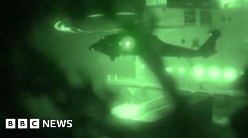 US Navy intercepts an Iranian ship during a maritime security operation.