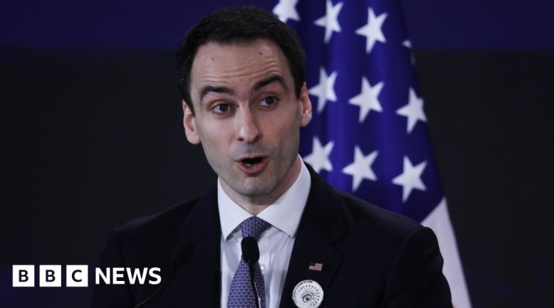 Business professionals discussing AI technology theft concerns in an office.