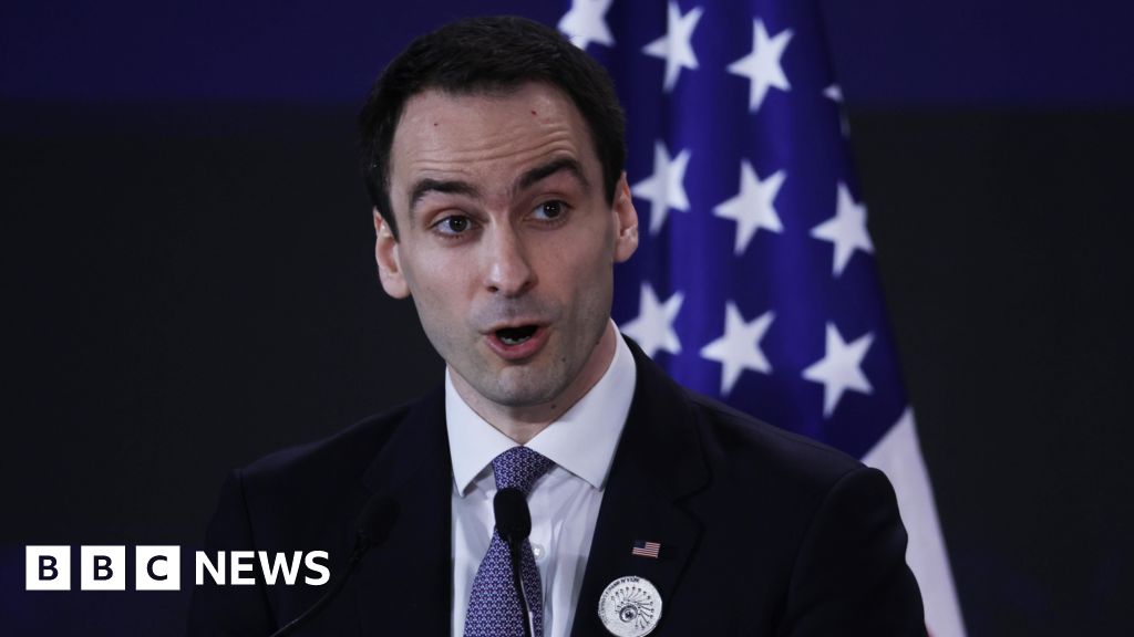 Business professionals discussing AI technology theft concerns in an office.