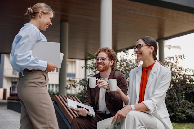 A confident woman in professional attire symbolizes Victoria Beckham's tattoo removal.