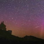 A family enjoying the Lyrid meteor shower while stargazing at night.