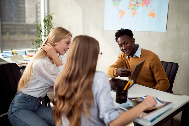 Group discussing visa policy change related to reparations in professional attire.