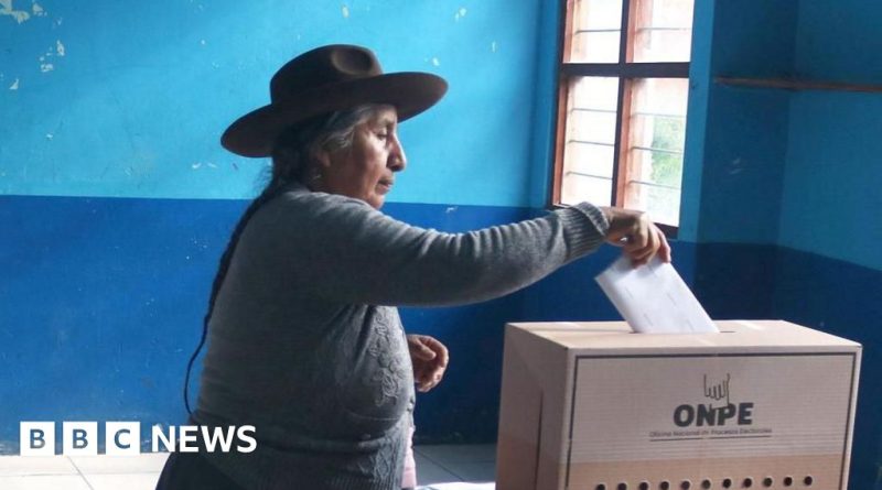 Voters participating in the Peru presidential election delays at a polling station.