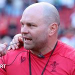 Wales team spirit shown in a coaching session with athletes training together.