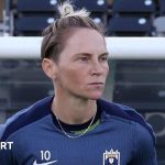 Jess Fishlock retirement celebration with fans in the stadium.