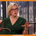 A concerned parent checking toys for asbestos in a safe home environment.