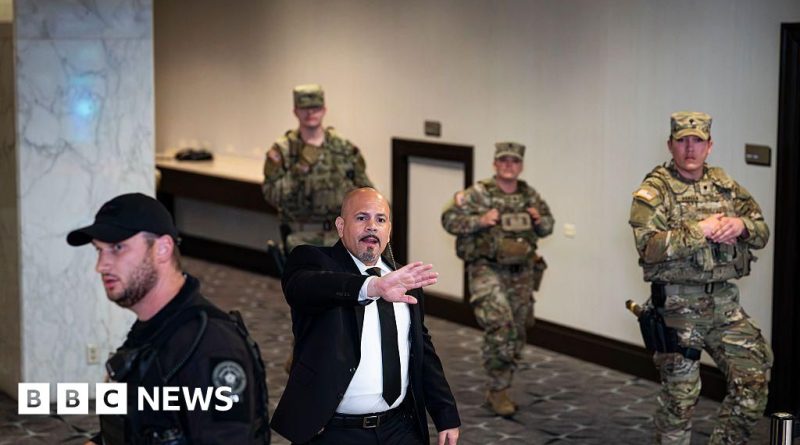 Guests at a formal dinner event with a focus on White House security review.
