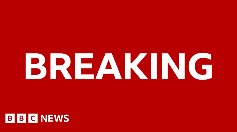 Emergency responders assisting injured pedestrians after a car hits pedestrians.