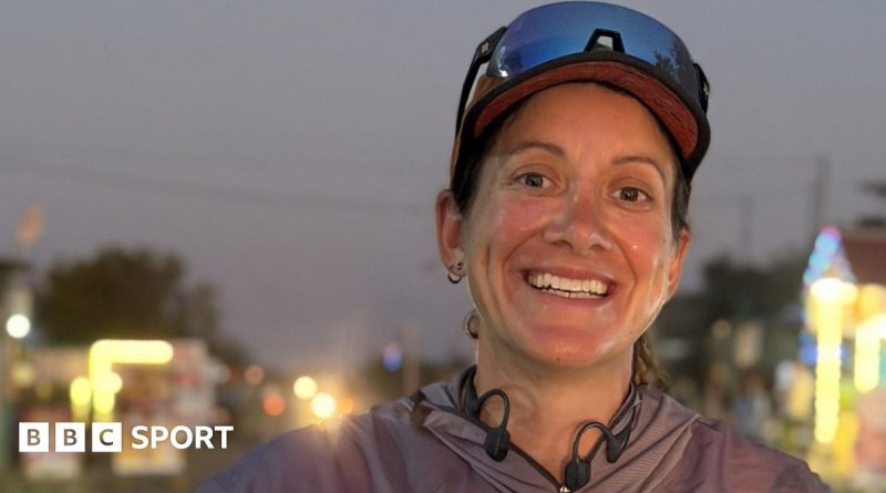 A woman running a marathon in India, honoring her father during her journey.