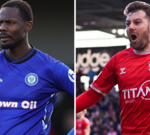 Fans cheering at a National League title match in an exciting stadium.