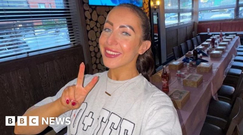 A diverse group of young professionals working together in an office environment.