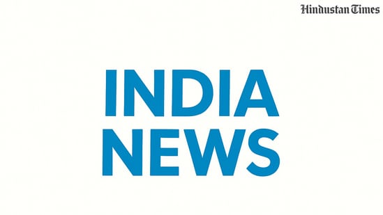Officials discussing plans for the Andhra Pradesh Bhavan in a meeting room.