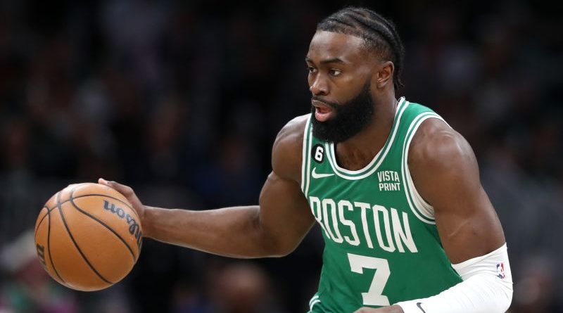 Celtics 30 wins celebrated during a dynamic NBA game atmosphere.