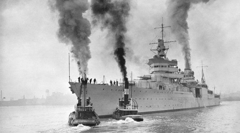 Researchers exploring a shipwreck using advanced underwater technology in the ocean.