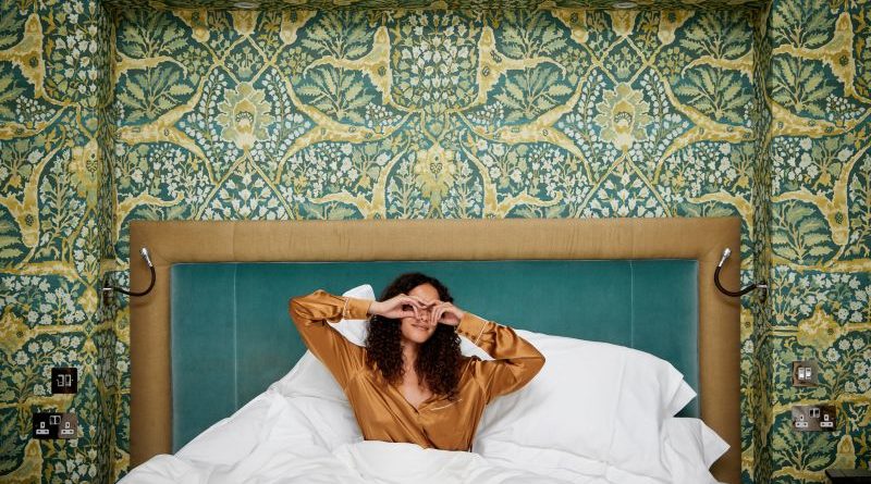 A peaceful hotel room representing sleep tourism with calming decor.