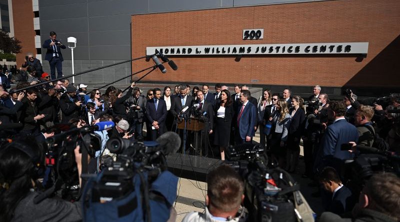 A courtroom scene depicting the Fox News Dominion settlement process with legal professionals.