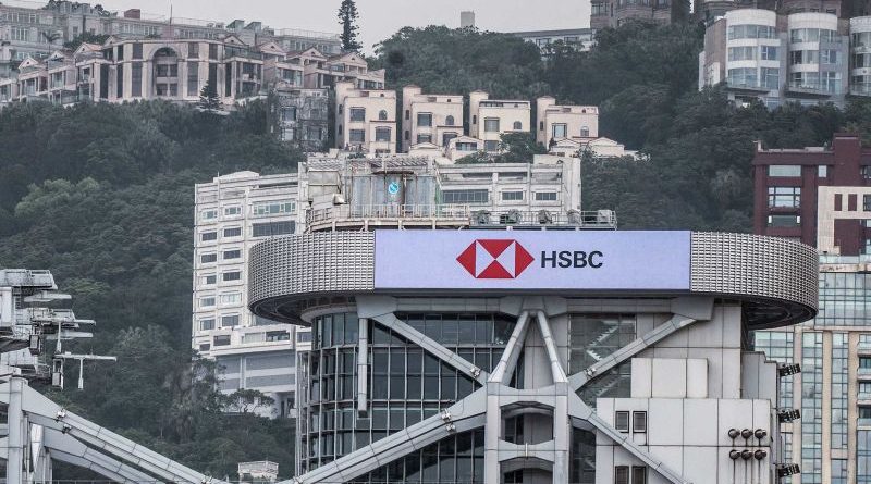 HSBC executives discussing shareholder concerns in a boardroom meeting.