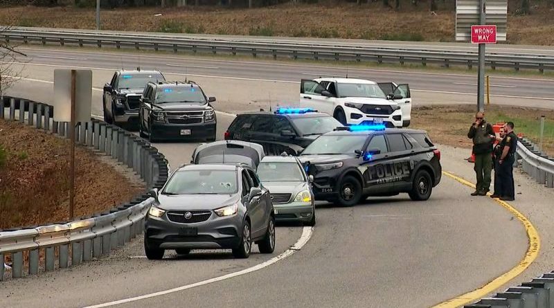 Police officers investigating a serious shooting scene in Maine.