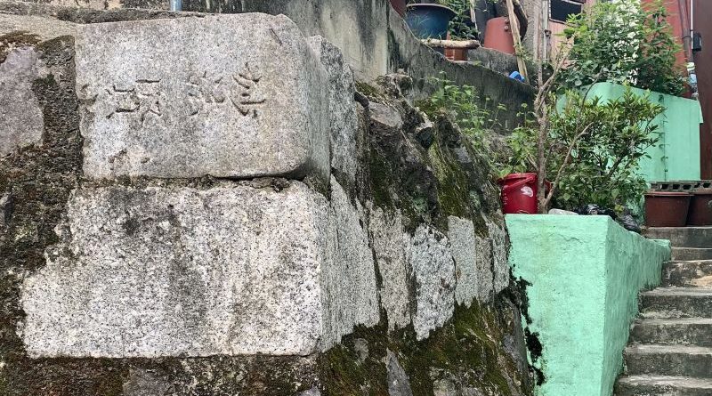 Ami-dong village in Busan, showcasing colorful houses and community life.