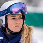 Lindsey Vonn recovery discussion with athletes in professional attire.