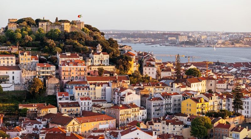A lively street scene in Lisbon showcasing the charm of digital nomads.